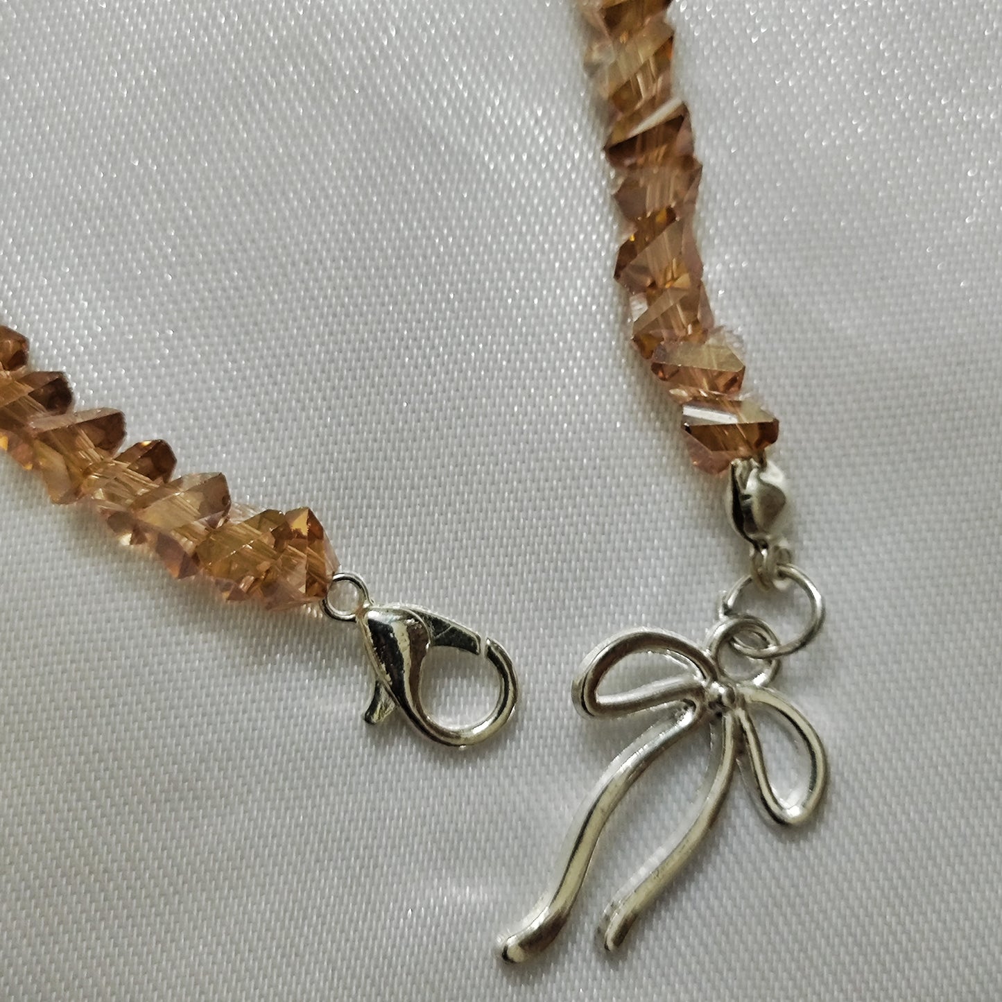 Gold triangle bead with bow charm bracelet