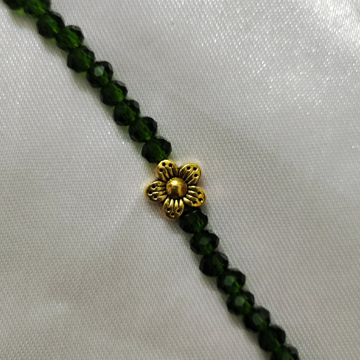 Green bead with Gold Floral bracelet