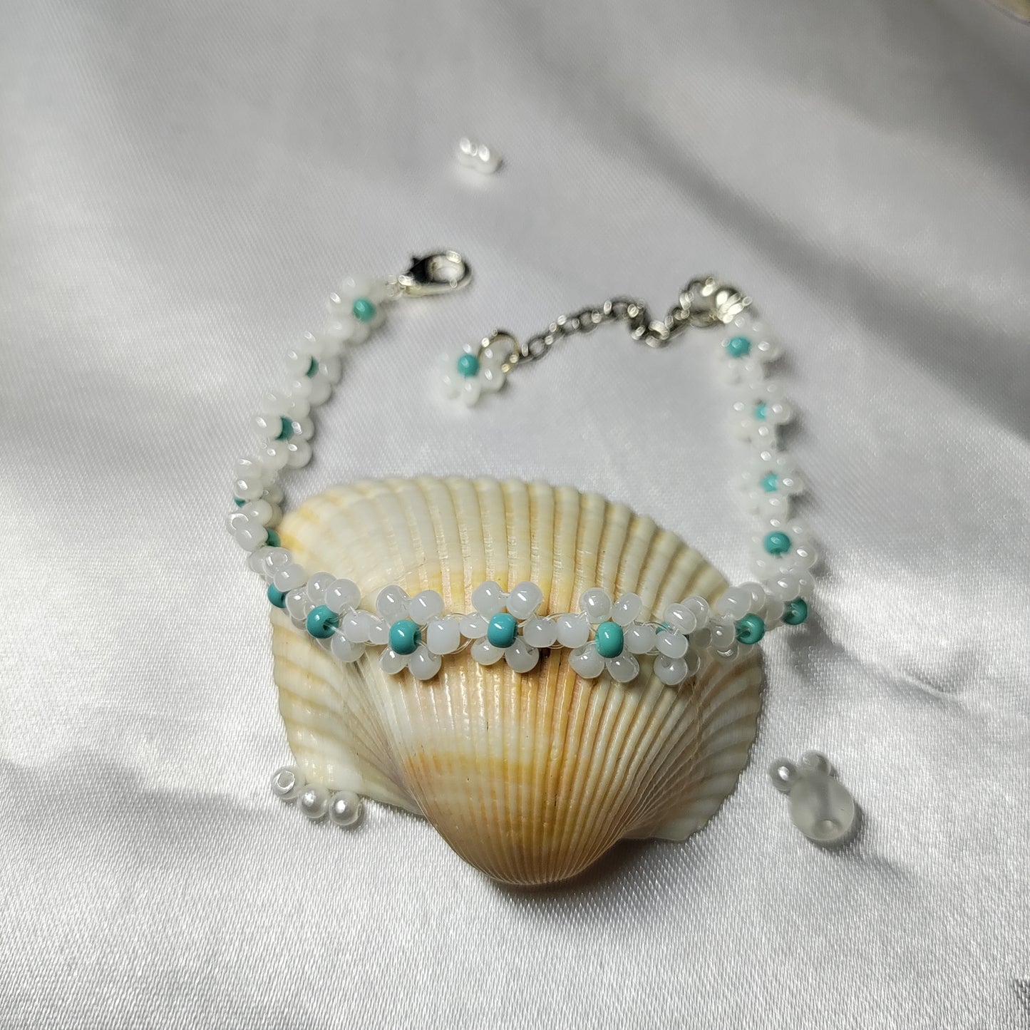 White and blue dot floral design