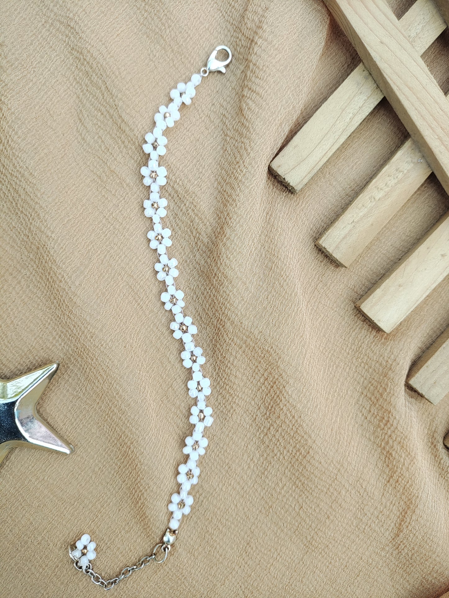 Gold in white beads floral design