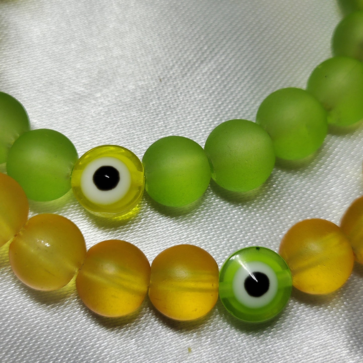Yellow green evil eye bracelet