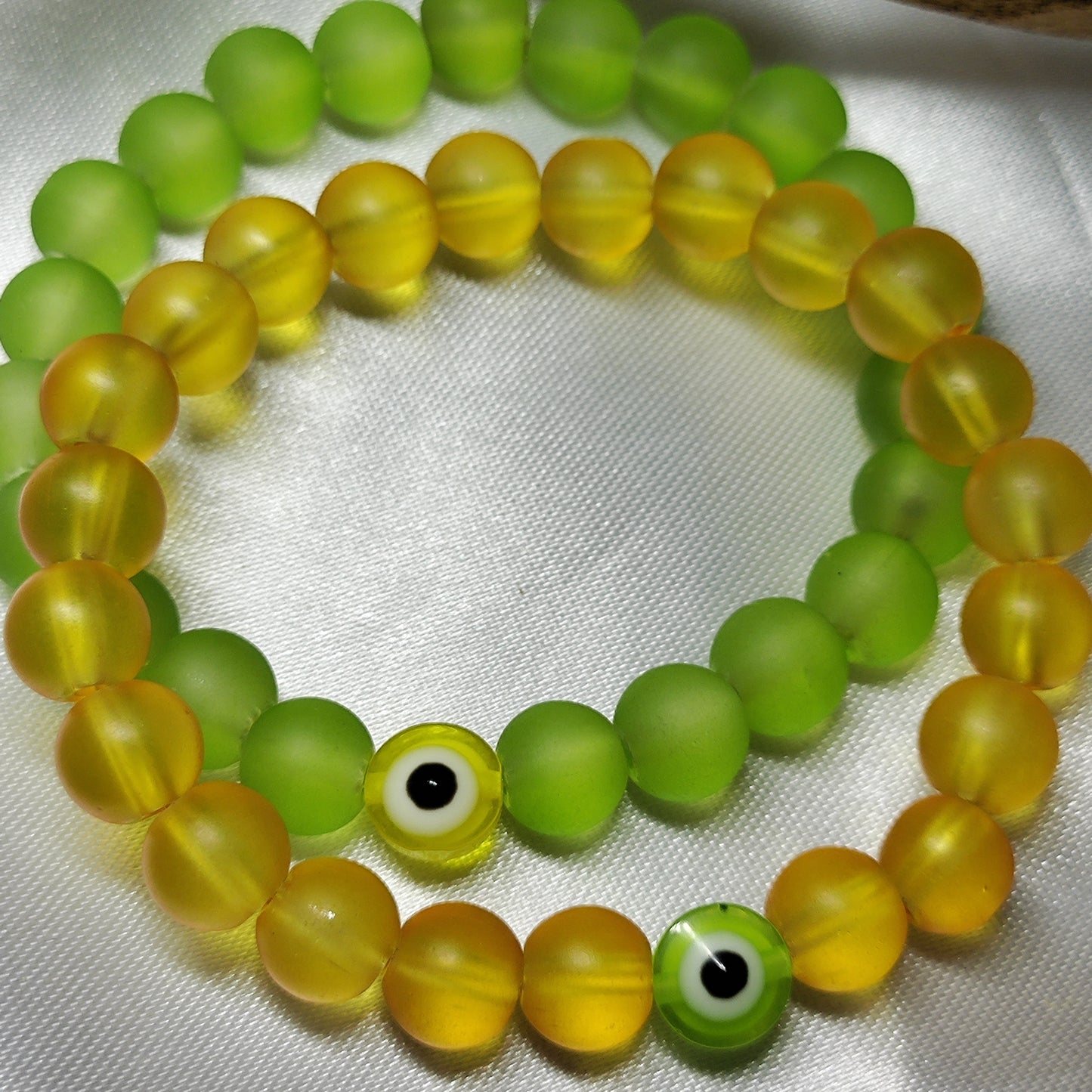 Yellow green evil eye bracelet