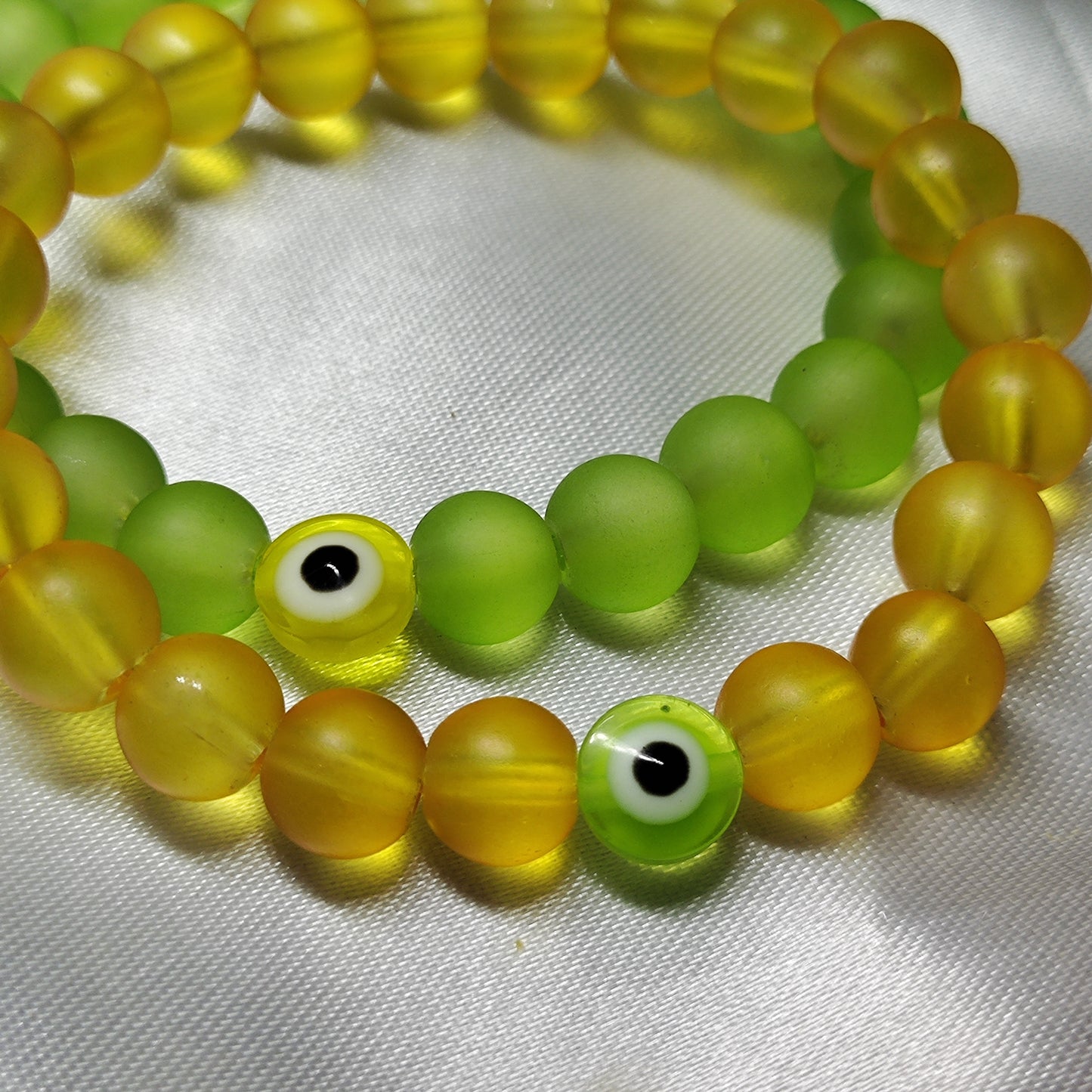 Yellow green evil eye bracelet