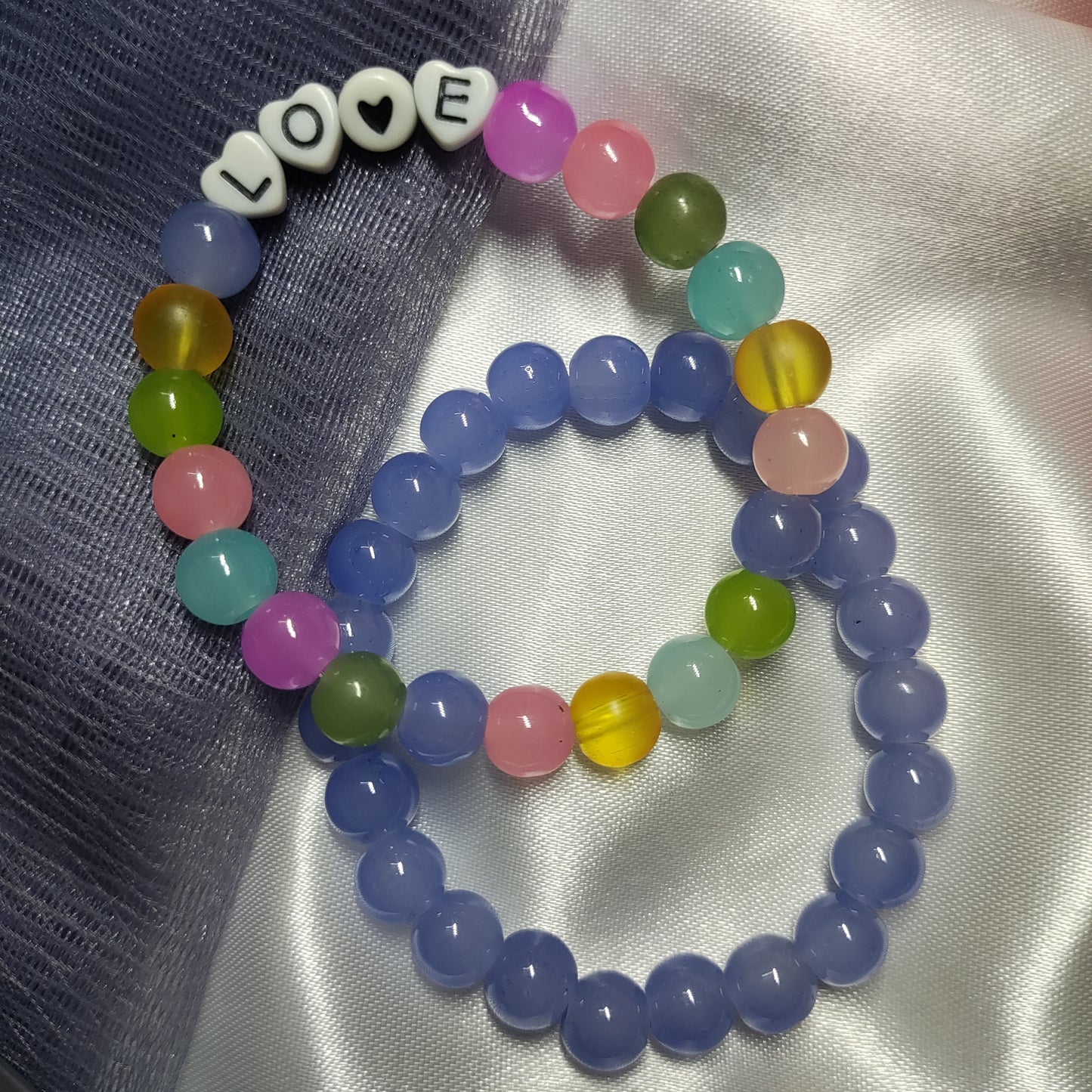 Blue and multicolour Love charm bracelet