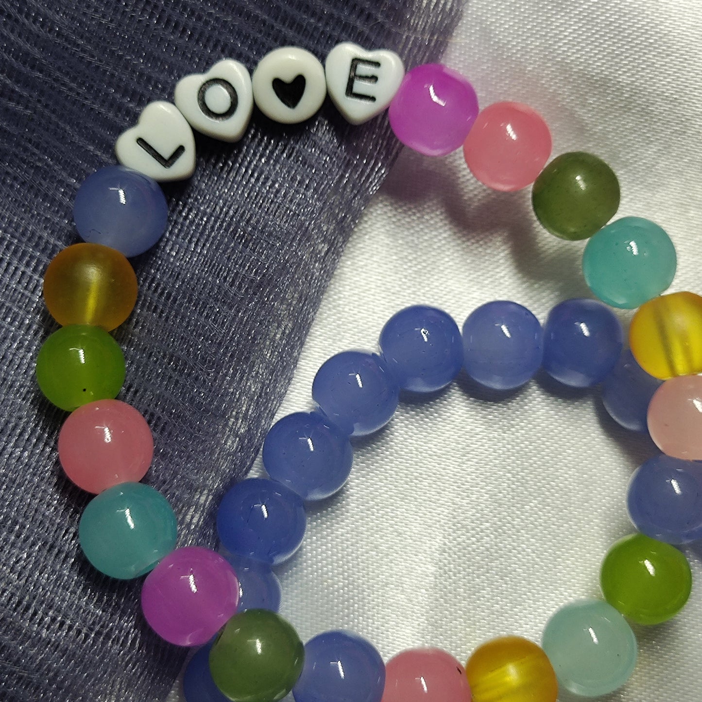 Blue and multicolour Love charm bracelet