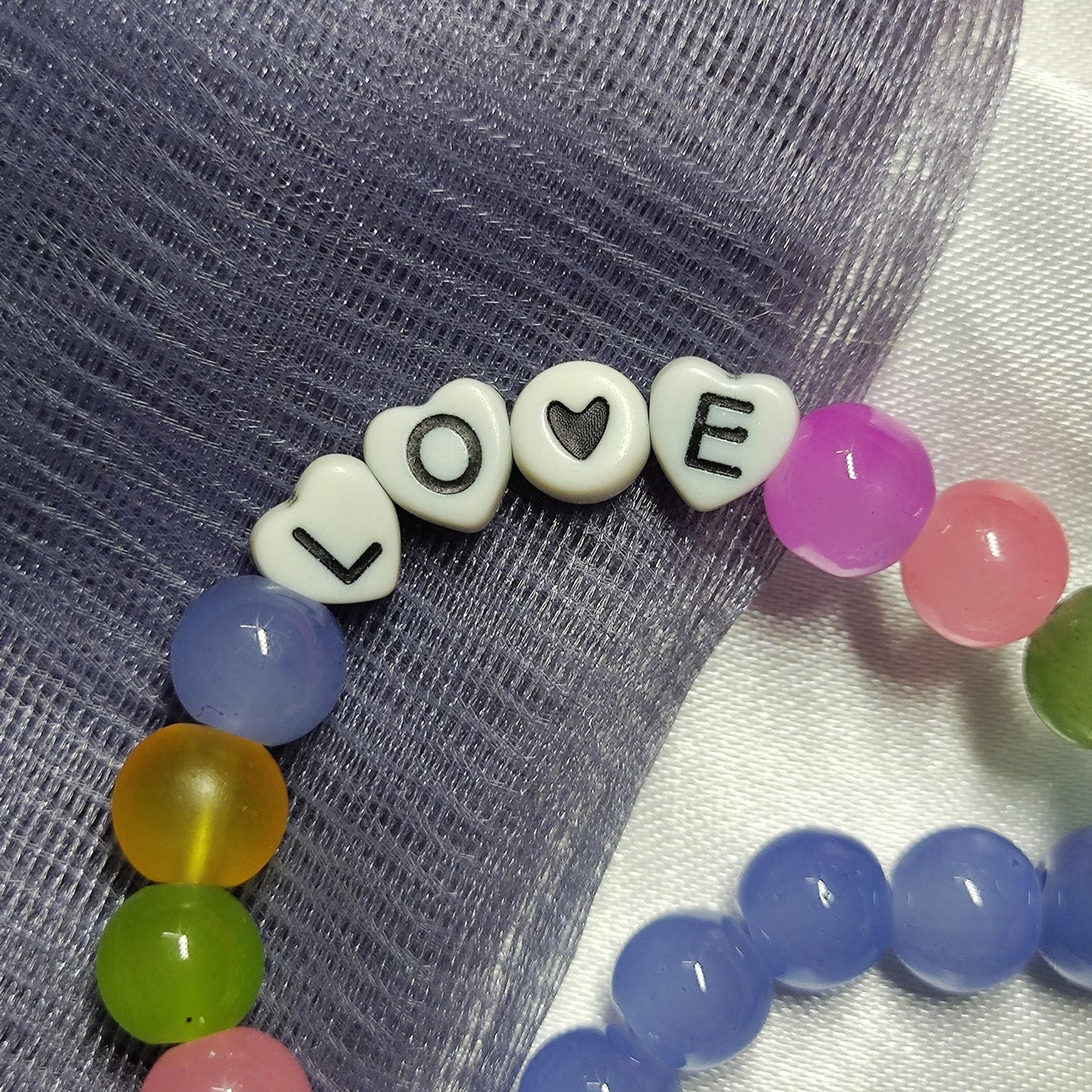 Blue and multicolour Love charm bracelet