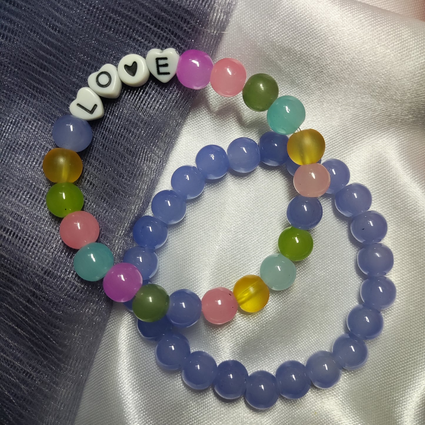 Blue and multicolour Love charm bracelet