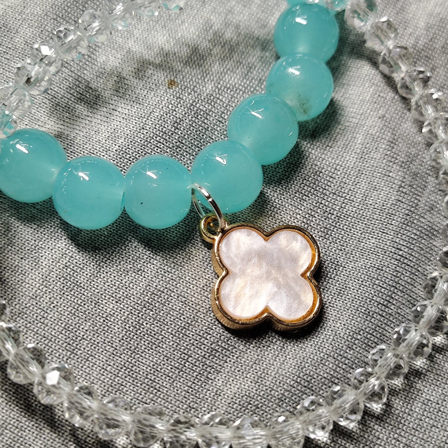 Blue with white clove charm bracelet