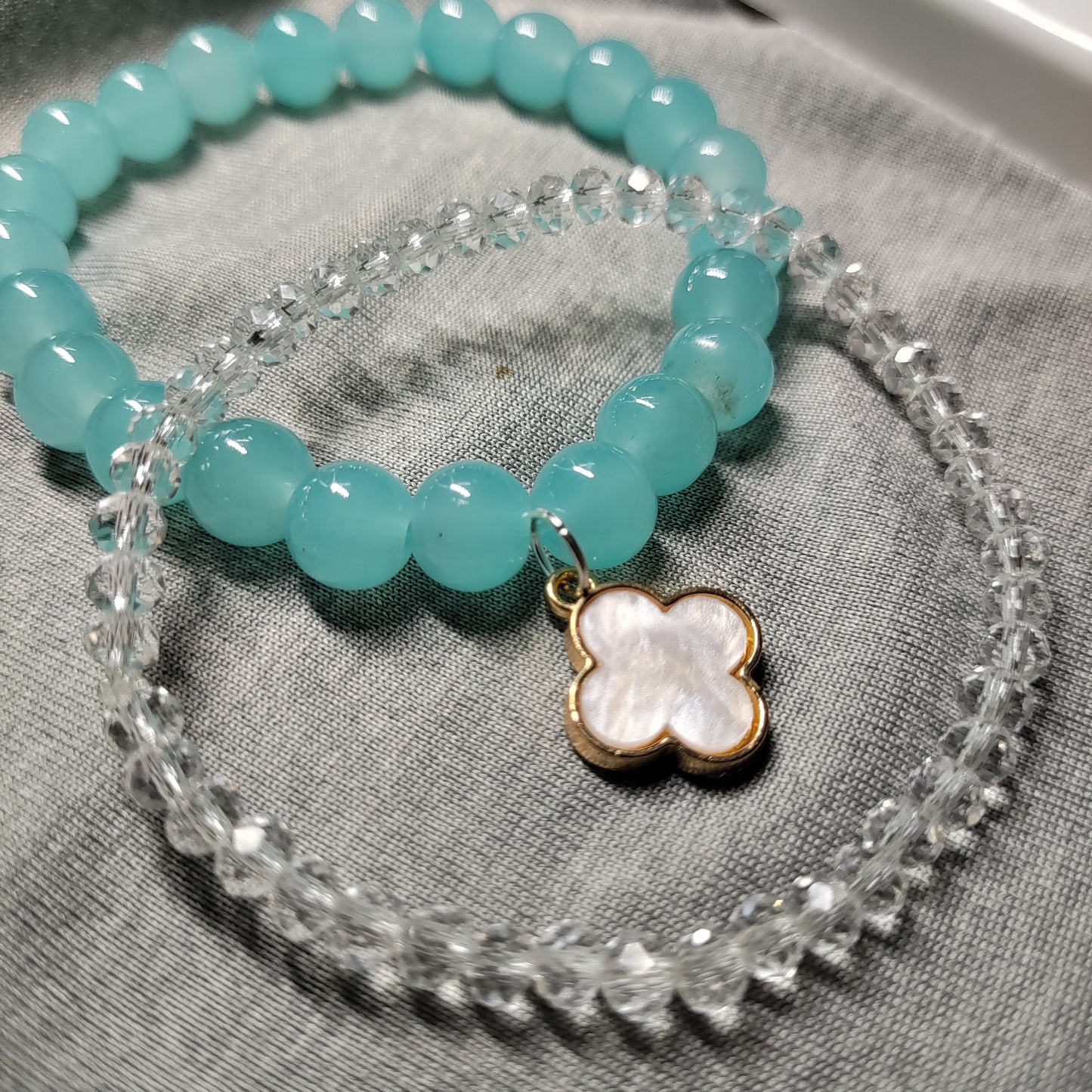 Blue with white clove charm bracelet