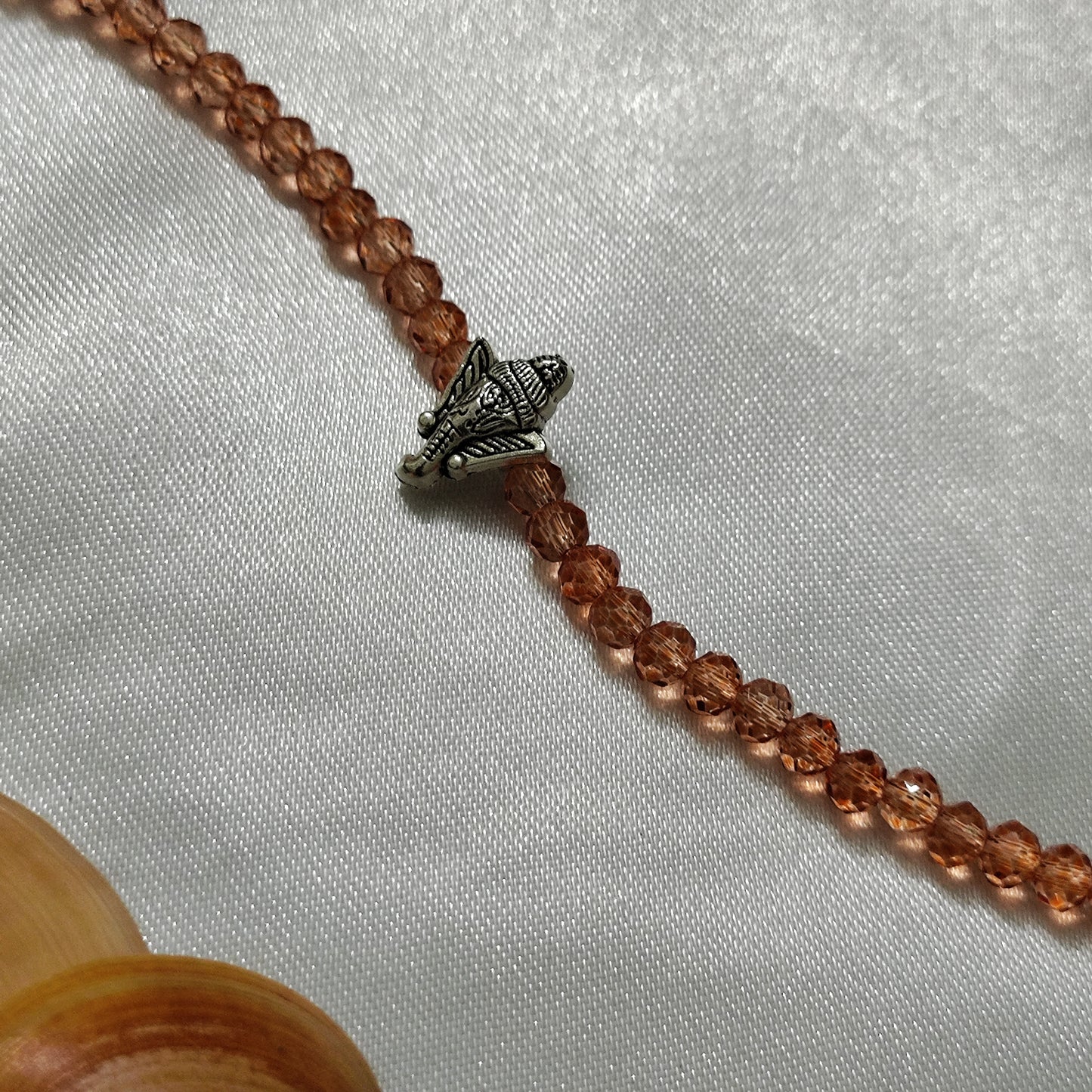 Orange bead with Ganesh pendant