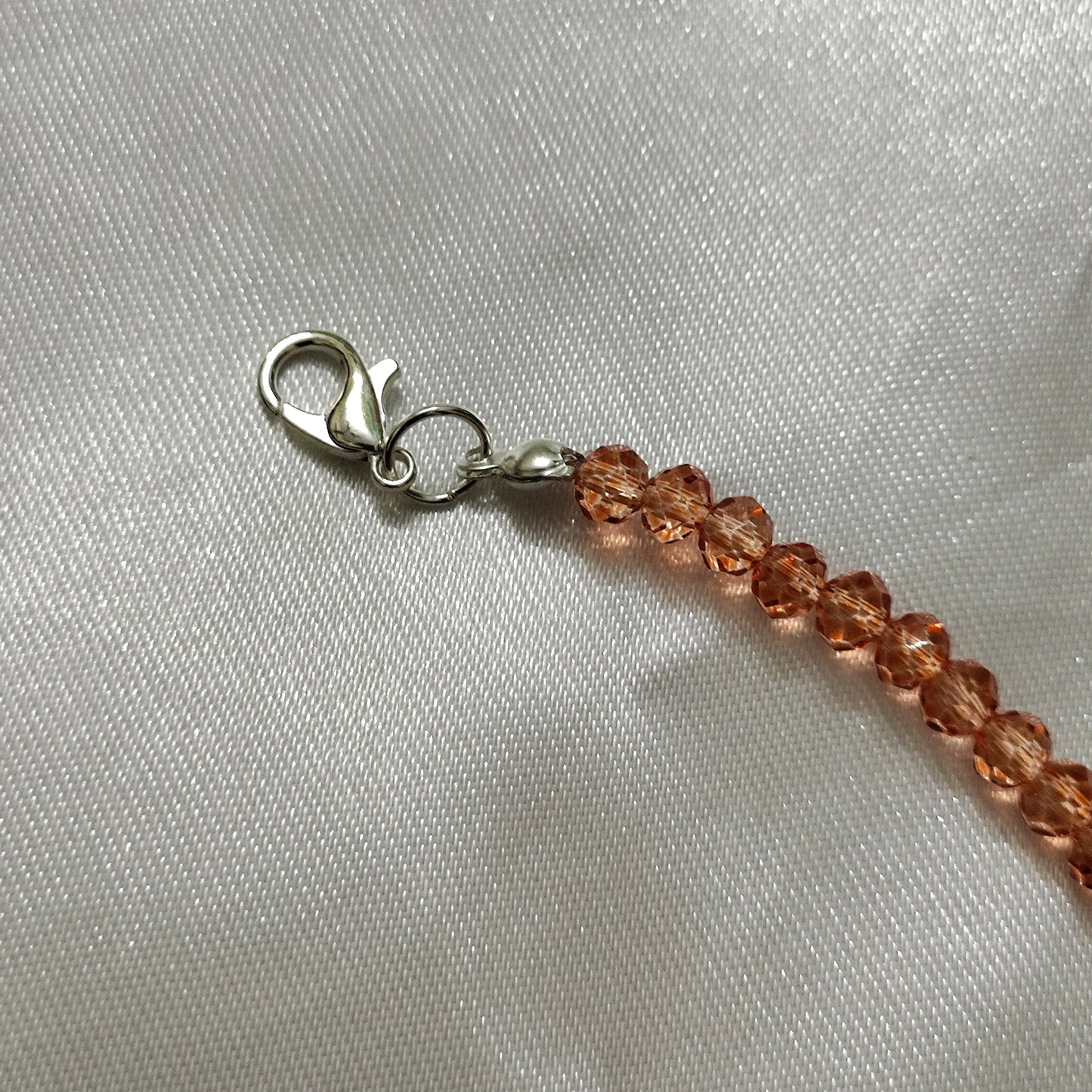 Orange bead with Ganesh pendant