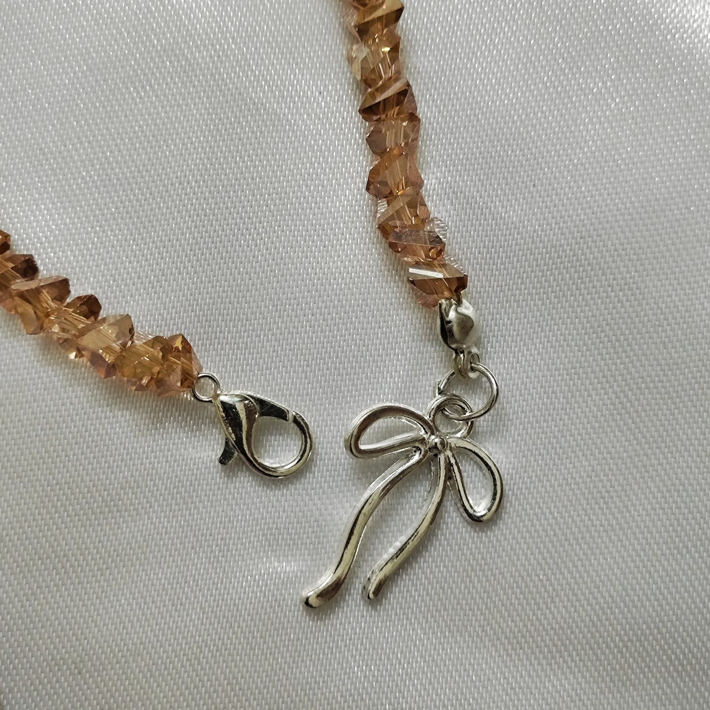 Gold triangle bead with bow charm bracelet