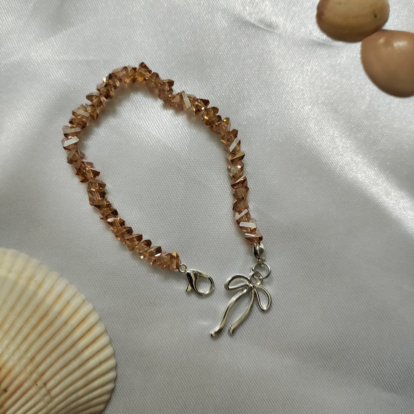 Gold triangle bead with bow charm bracelet