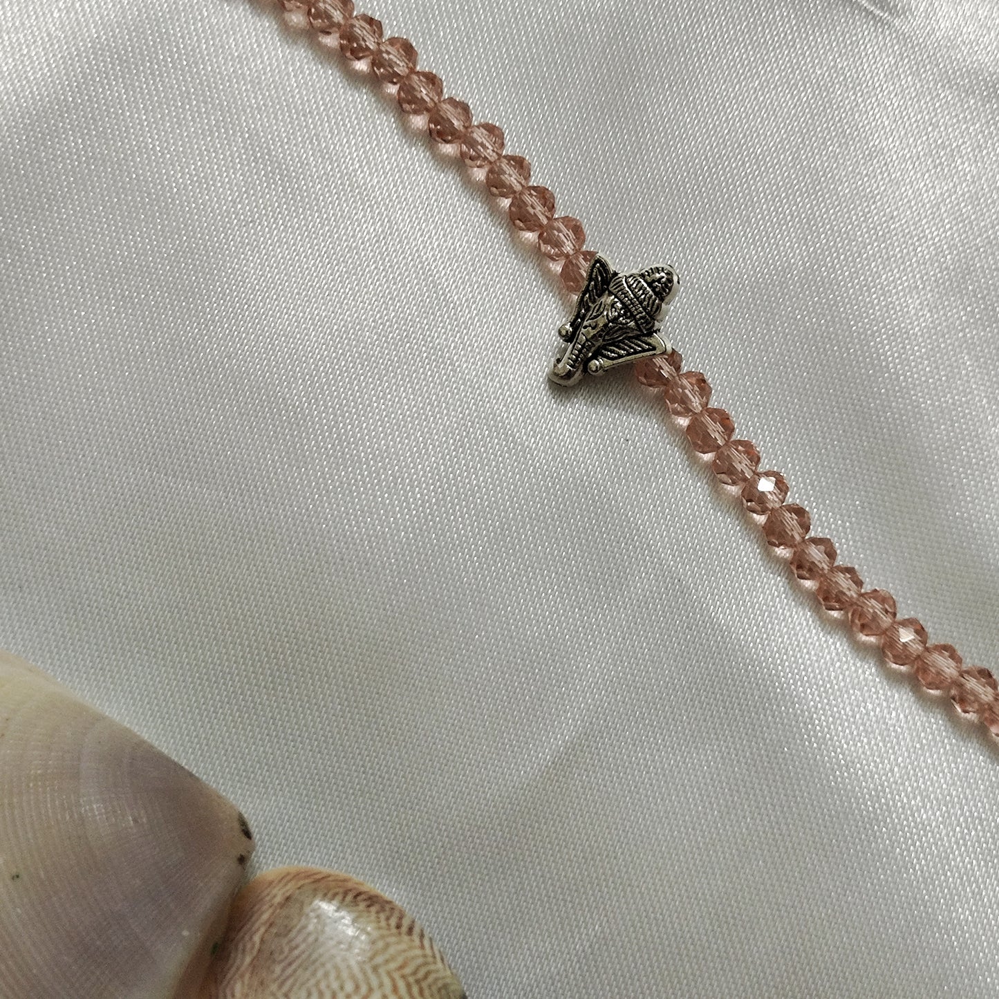 Pink beads with Ganesh pendant
