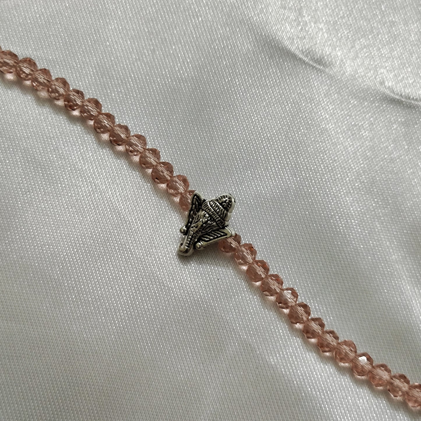 Pink beads with Ganesh pendant